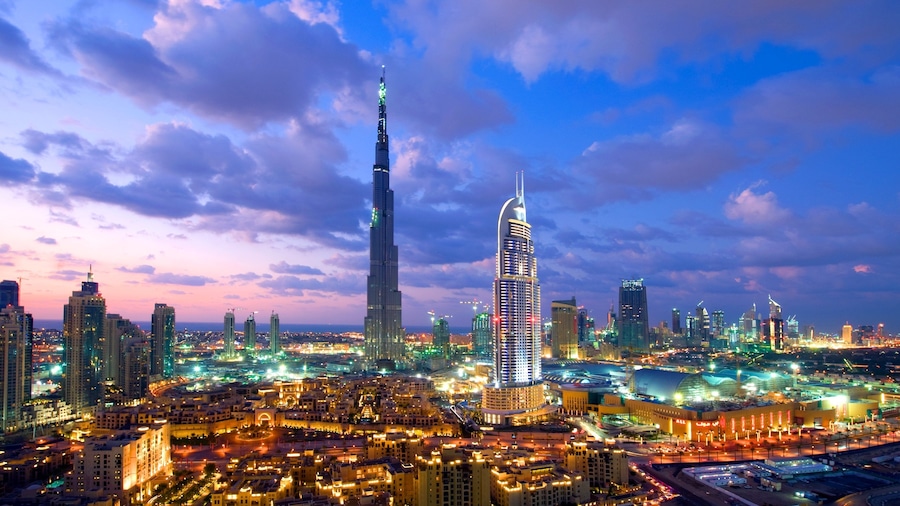 Dubai which includes a sunset, modern architecture and skyline