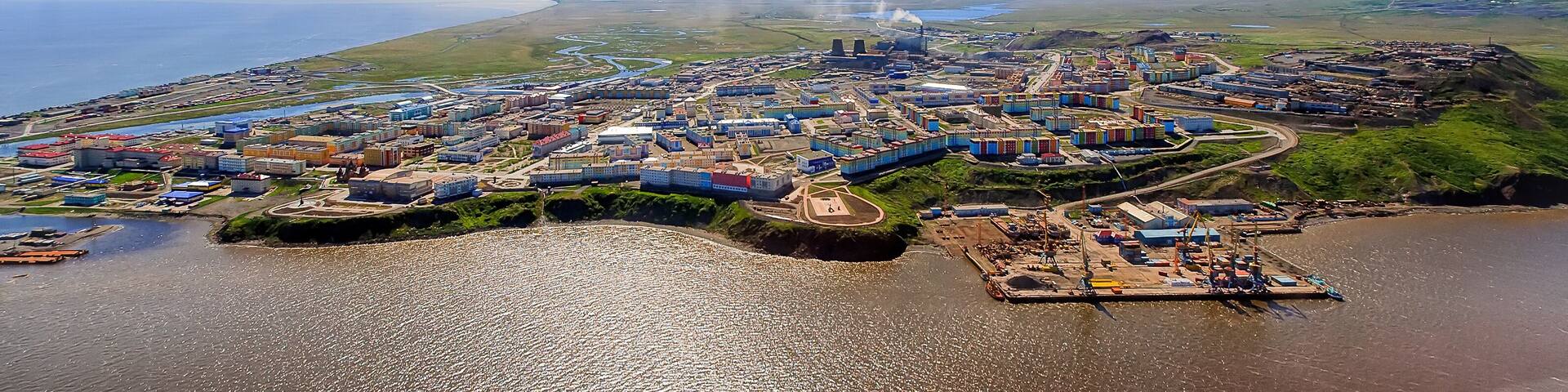 Panorama of the city of Anadyr. Aerial view of the Arctic port town. Anadyr is the easternmost city of Russia and the administrative center of the Chukotka Autonomous Okrug. Siberia, Russian Far East.