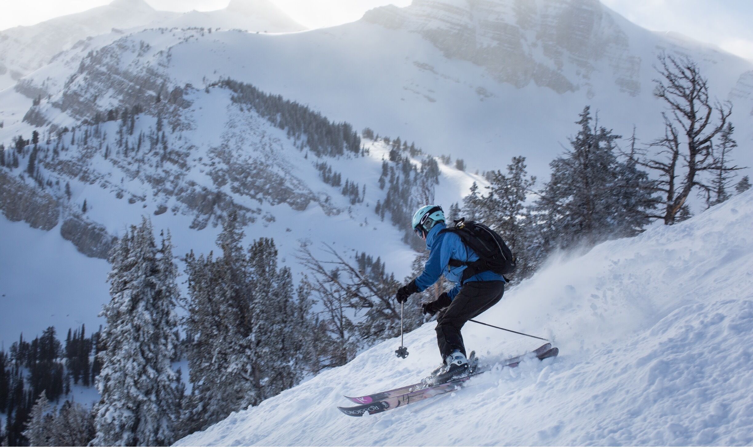Skiing down from the top of the mountain
