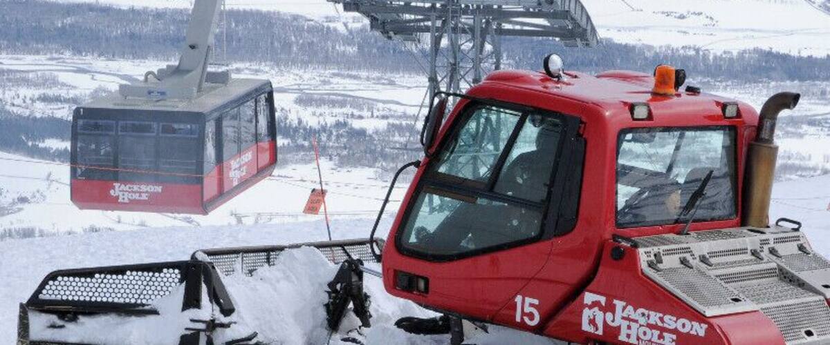One of Jackson Holes Snocats on top of Rendezvous Mountain. Accessible by tram shown descending in the background.
Every night after the slopes close, the ski lifts stop running, and the pubs fill up with ski-rats celebrating having cheated death once again... the mountain magically transforms itself.
At least one would think as we see their twinkling lights dancing through the mountains trees at night like forest pixies. the next morning we find a fabulous white corduroy carpet waiting for us like a gift from the ski gods.
But it's not magic... It's the unsung artistry of the "The Grooming Crew" !!
AND... within this crew are the elite... The Winch Cat Crew.
Because of the crazy inclines these guys traverse they have to anchor in with cables on winches so they don't tumble down the mountain. Some of these quarter of a million dollar + machines are rated to a gravity defying 45 degree slope !
So, next time you are thawing your slope weary bones from the inside out with a shot of Fireball Whiskey or PBR... raise your glass to the grooming crew !
#snow #jacksonhole