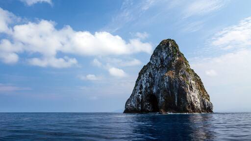 The picturesque Etarick or Monument Rock (Wotanimanu), located off Mataso Island, midway between Efate and the Shepherd Islands, Vanuatu, is a unique rock formation rising from depths of 1000m.