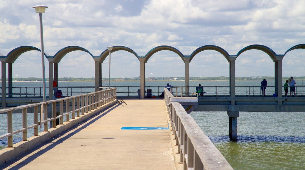 Jekyll Island which includes a river or creek as well as a small group of people