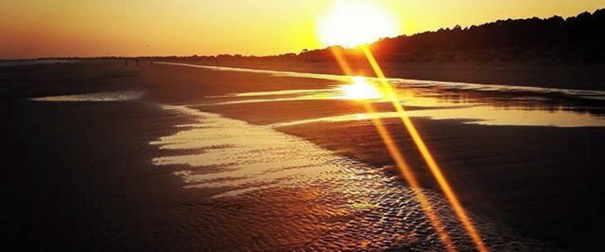 Watch the sunset from Kiawah Beachwalker Park, Kiawah Island, South Carolina. Kiawah is a golf-centered resort island with lots of palmettos, pine trees, and waterbirds. The dolphins practice "strand feeding" here, which is the act of herding the fish up on the beach along with a wave and wriggling up on the sand to retrieve them.
#UStravel
#travel
#naturelovers
#beach
#sunset
#Kiawah
#SouthCarolina
#RVlife
#earthporn
#goldenhour
#camping
#glamping
#wanderlust
#beachbound
www.RVLuckyOrWhat.com