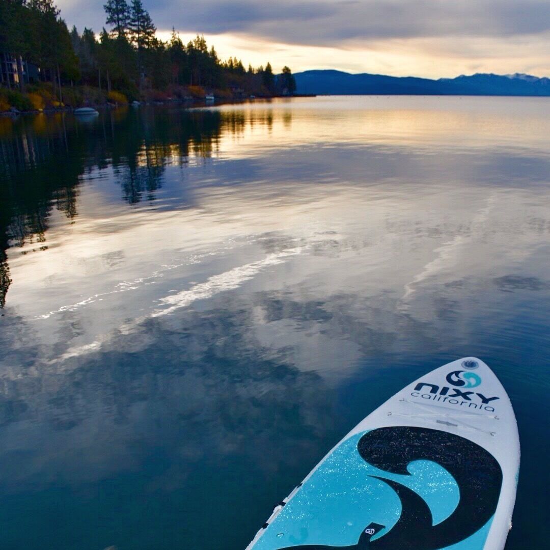 Beautiful sunrise paddle session in cold Lake Tahoe 