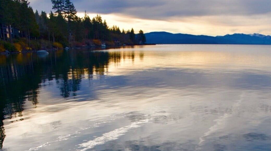Beautiful sunrise paddle session in cold Lake Tahoe