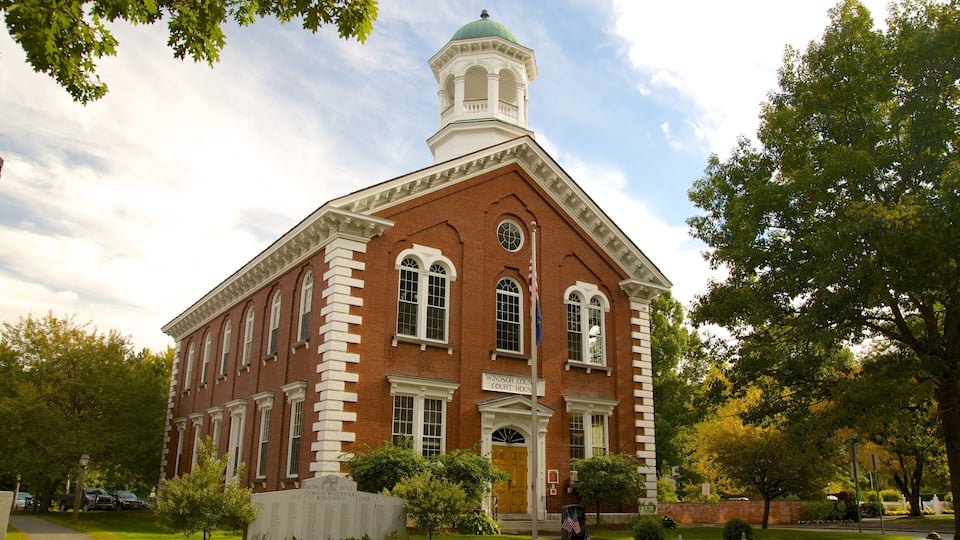 A historic courthouse with a prominent clock tower and a brick facade.
