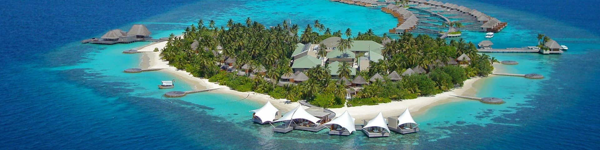 Maldives featuring island images and a luxury hotel or resort