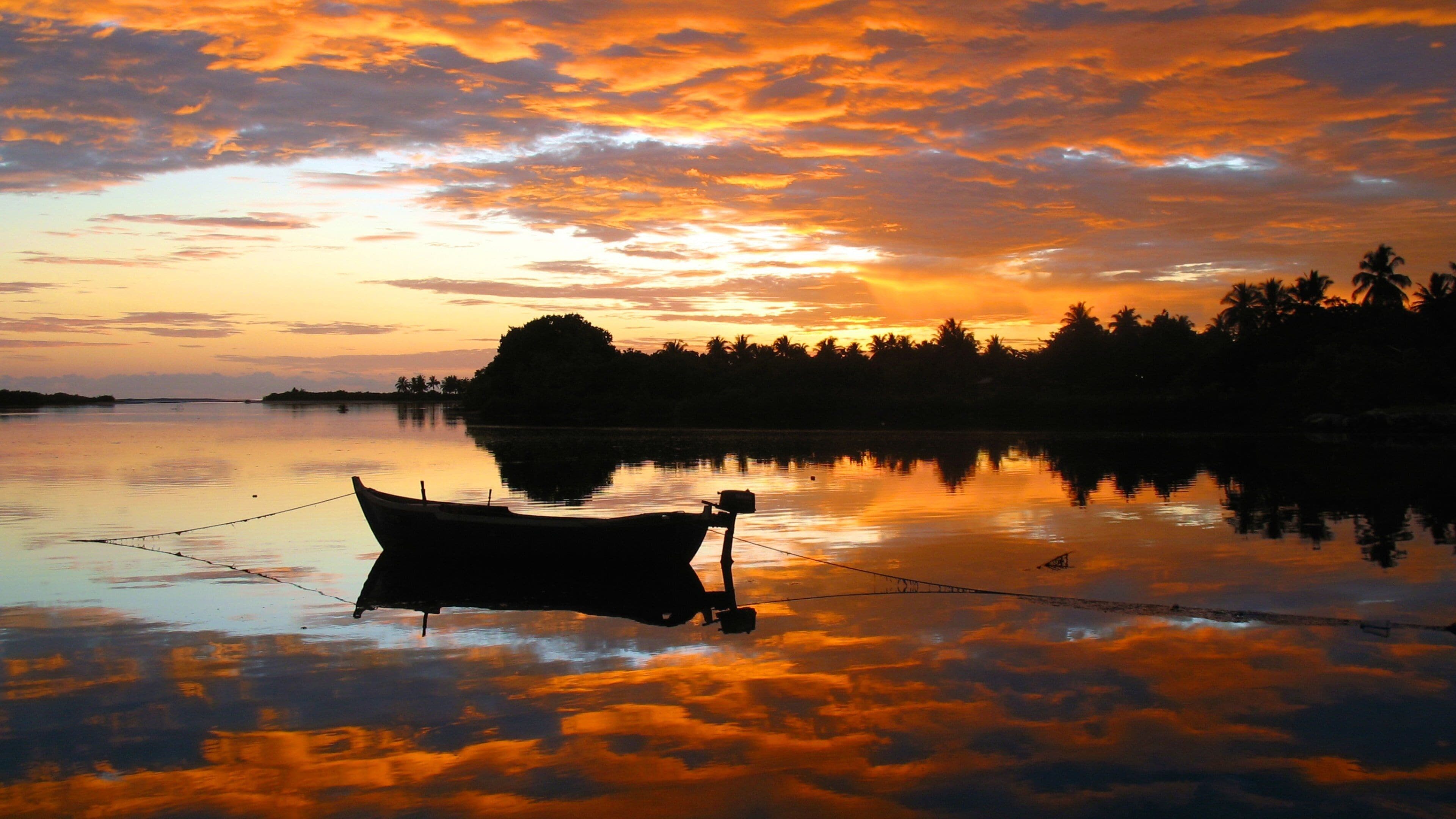 Maldives featuring island views, a bay or harbor and a sunset