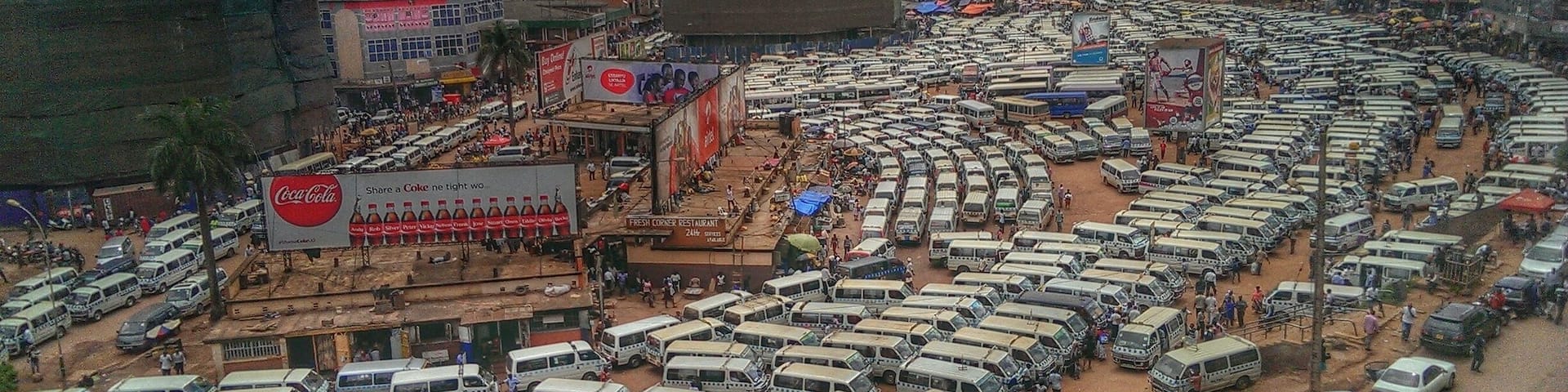Over 3000 minibuses-taxis (known as Matatus) squeezed in the old taxi park in Kampala. Amazingly, travellers and drivers can still manage to find their way around.