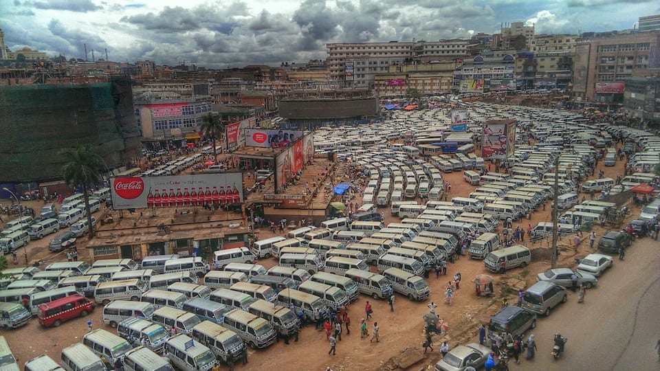 Over 3000 minibuses-taxis (known as Matatus) squeezed in the old taxi park in Kampala. Amazingly, travellers and drivers can still manage to find their way around.