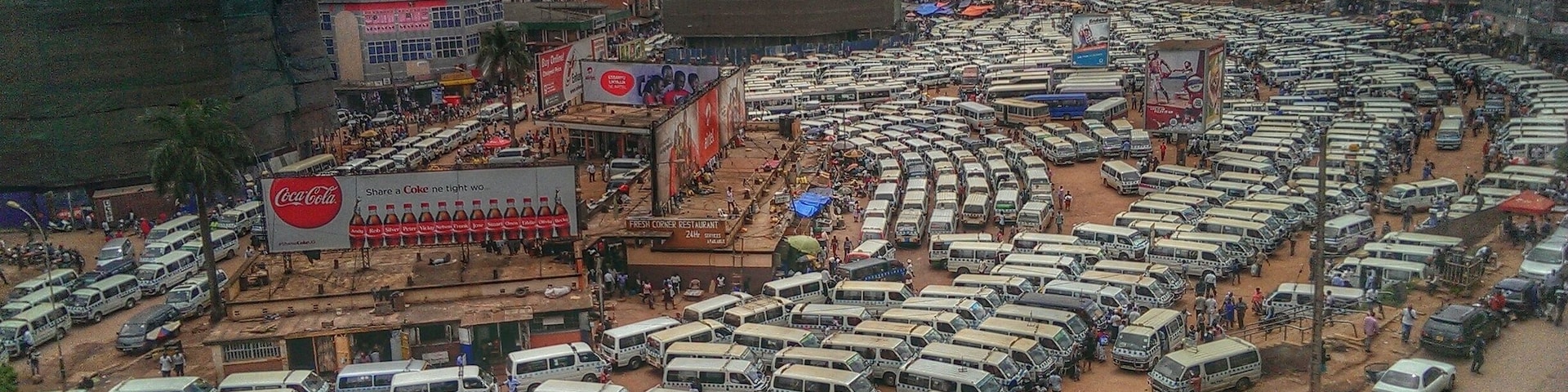 Over 3000 minibuses-taxis (known as Matatus) squeezed in the old taxi park in Kampala. Amazingly, travellers and drivers can still manage to find their way around.