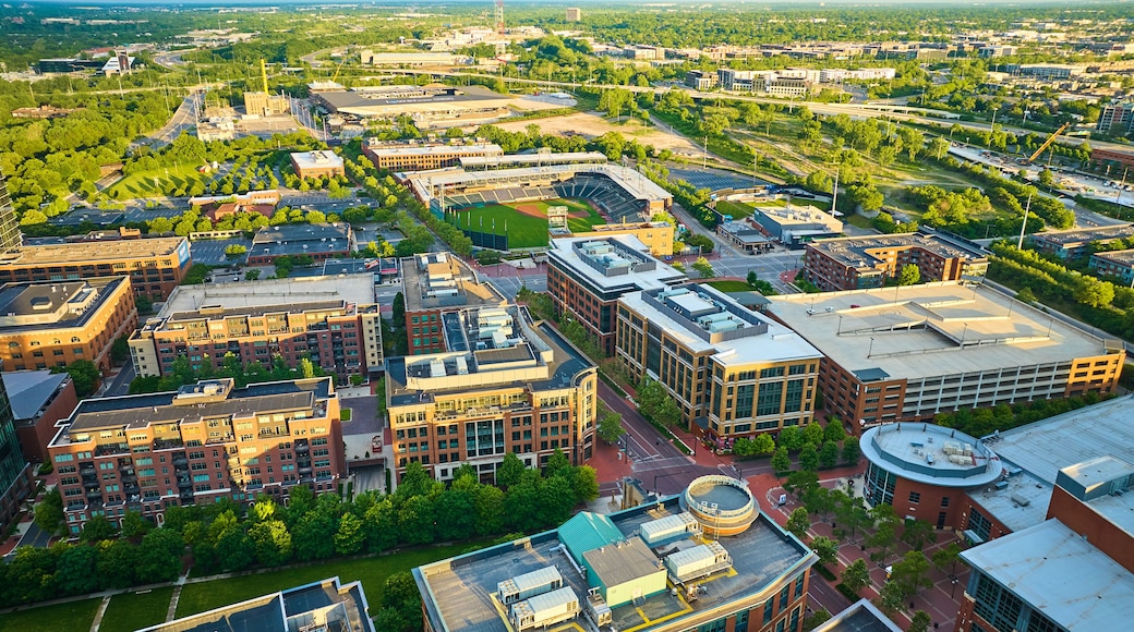 Golden light on landscape and buildings with Columbus Clippers stadium in aerial over Ohio