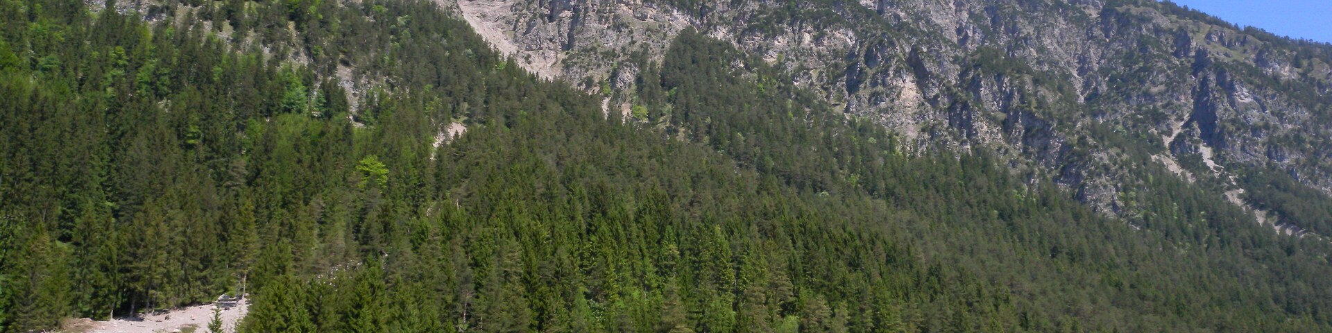 Lake in Heiterwang in Tyrol with Tauern (1841 m) and Schrofennas (1708 m).