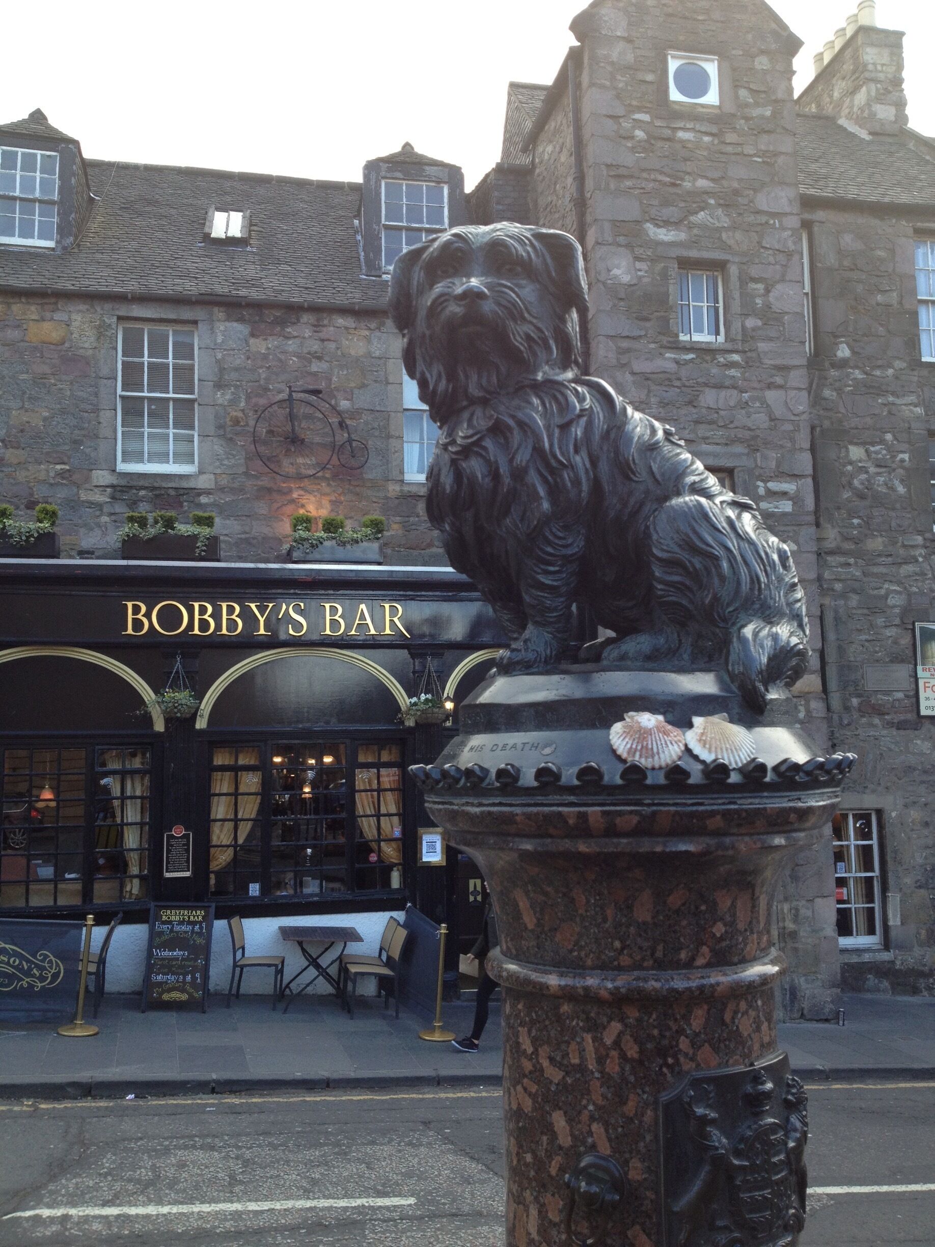 Bobby's Bar at the Greyfriar Kirkyard is a darling homage to Greyfriar's Bobby, a loyal terrier beloved by many. Leave a token for the pup for good luck! #edinburgh #scotland 