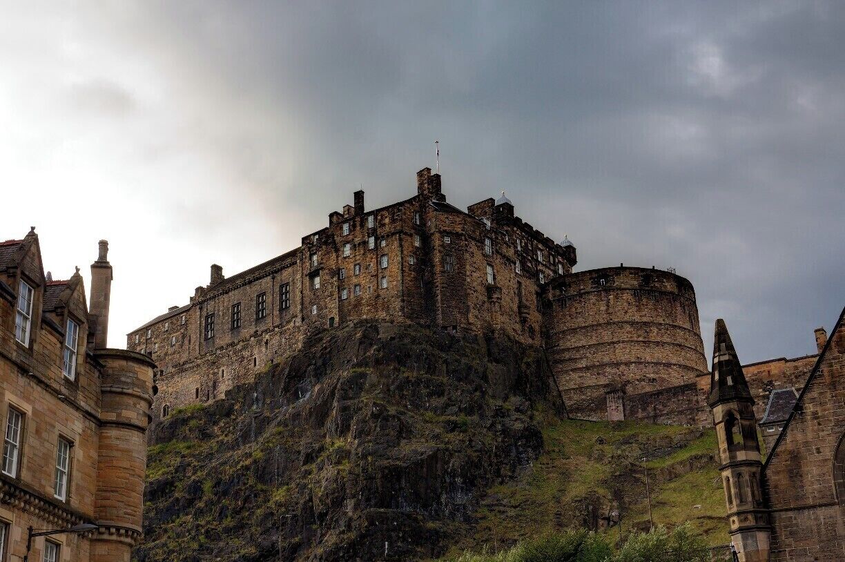 Taken from Grassmarket Square, south of the castle.

The castle stands on top of an extinct volcano, like some of the other hills in the area. Archaeological evidence suggests that it has been occupied since the Iron Age. 