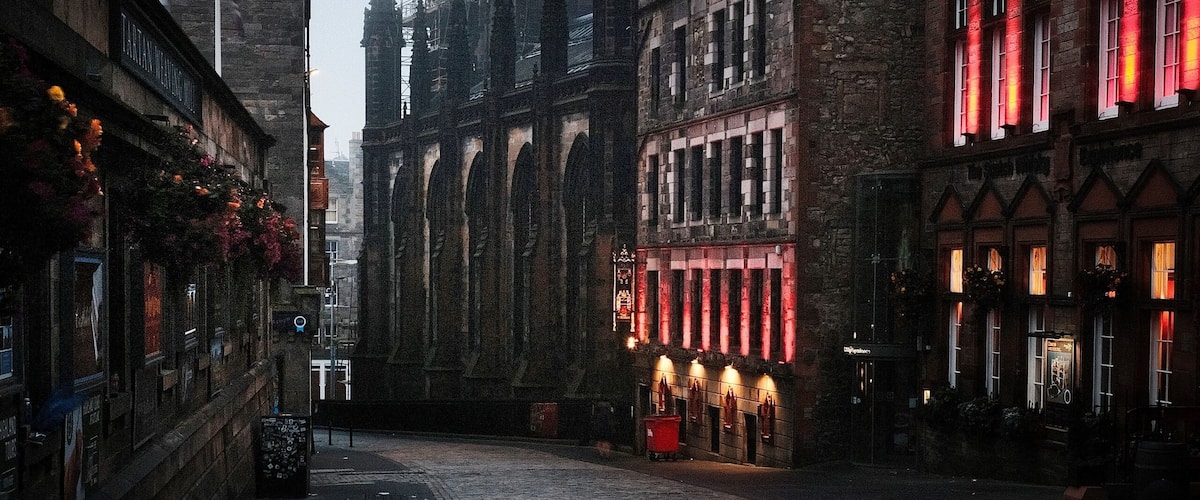 Moody morning photo in Edinburgh Scotland. Taken just outside the the castle esplanade. Mornings are when you have the best chance at fog