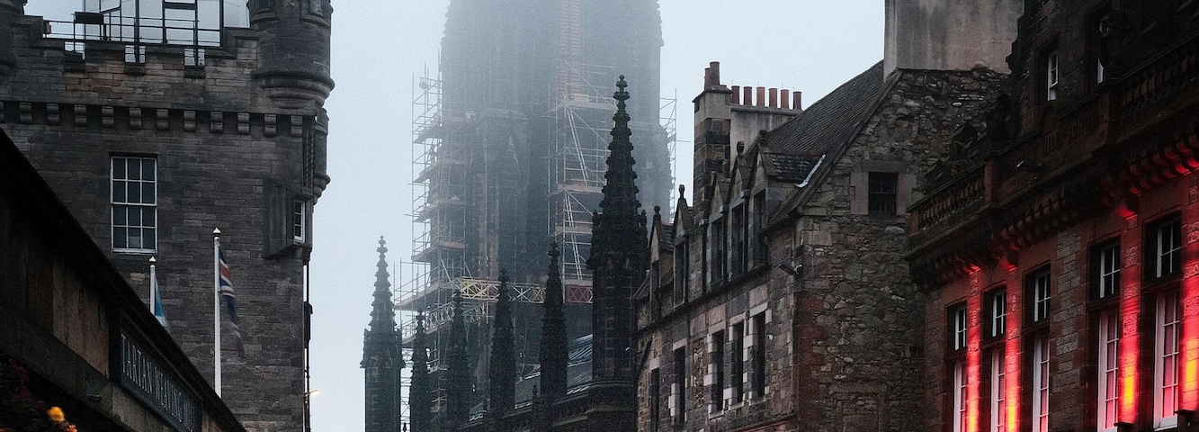 Moody morning photo in Edinburgh Scotland. Taken just outside the the castle esplanade. Mornings are when you have the best chance at fog
