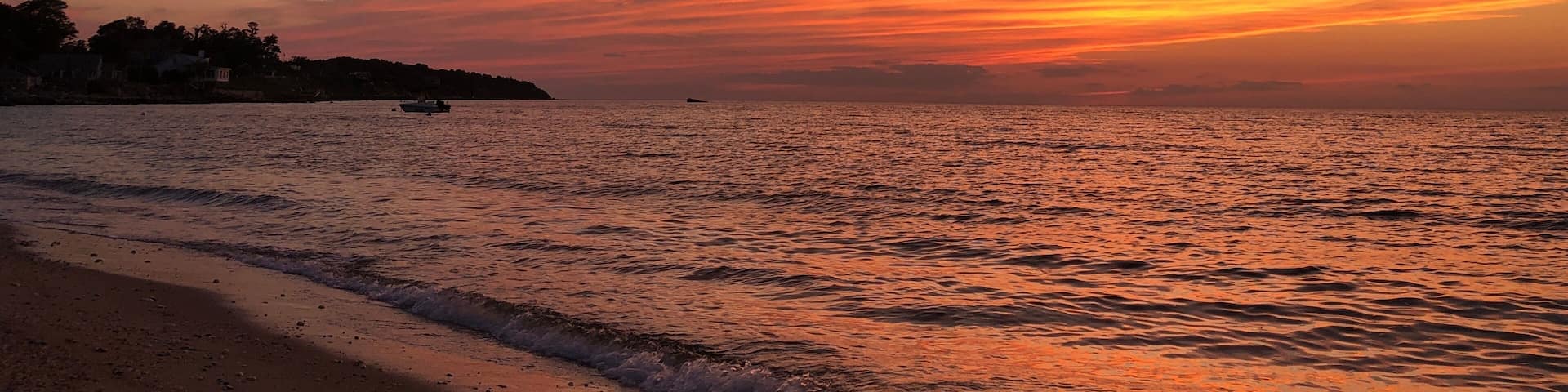 Dramatic sunset at Town Beach, Southold, Long Island, New York