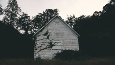 an old church right off of US 23 in greenup, ky. i found perfectly-placed crocheted blankets and, strangely, a flower vase knocked off of a table onto the floor.