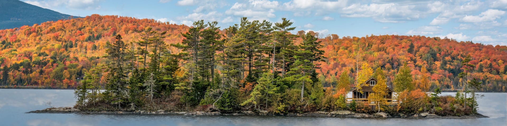 Little island with house on Moosehead Lake - Greenville, Maine - Autumn colors