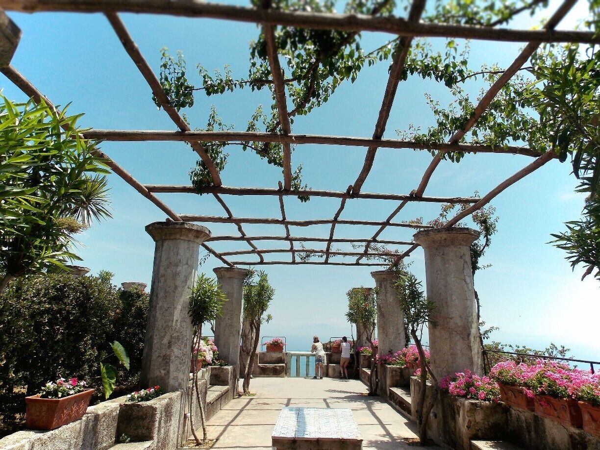 A pergola with a view of the sea.