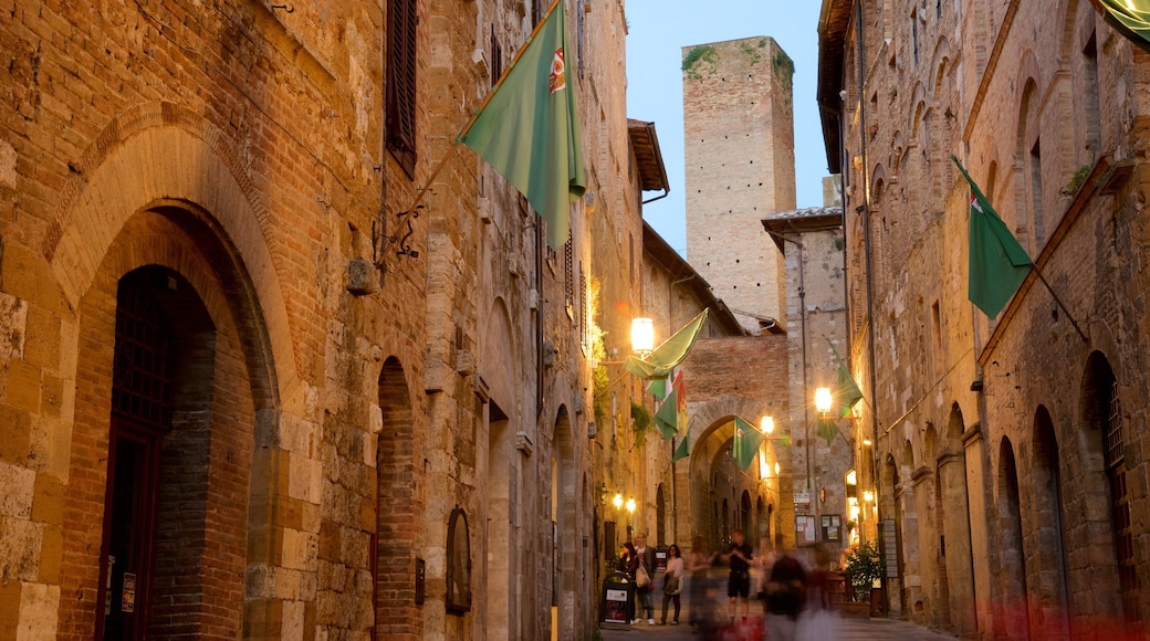 San Gimignano featuring night scenes, street scenes and heritage architecture