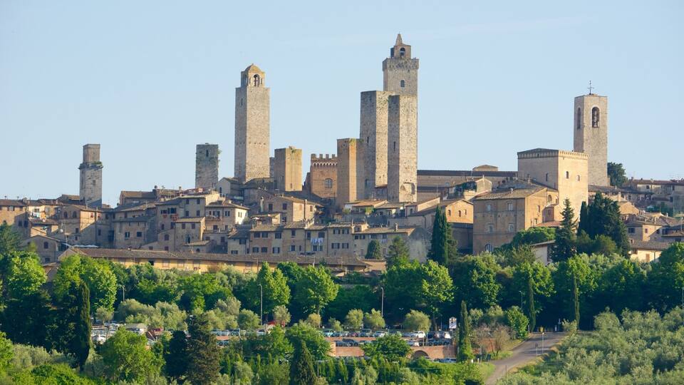 A historic town with medieval towers and buildings.