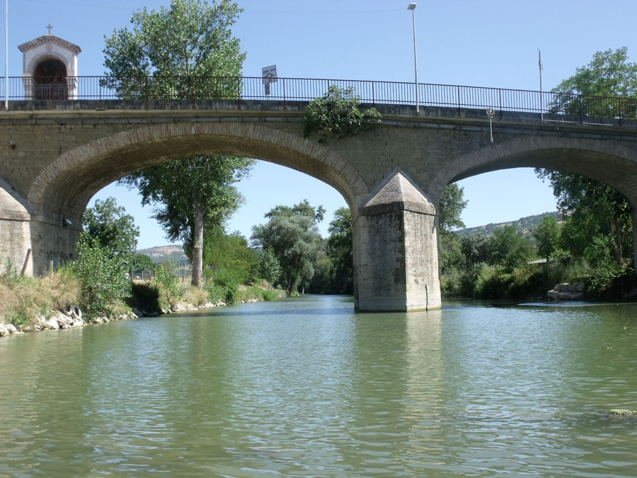 Brigde Ponte a Petrignano and the Chiascio river in Petrignano, hamlet of Assisi, Province of Perugia, Umbria, Italy
