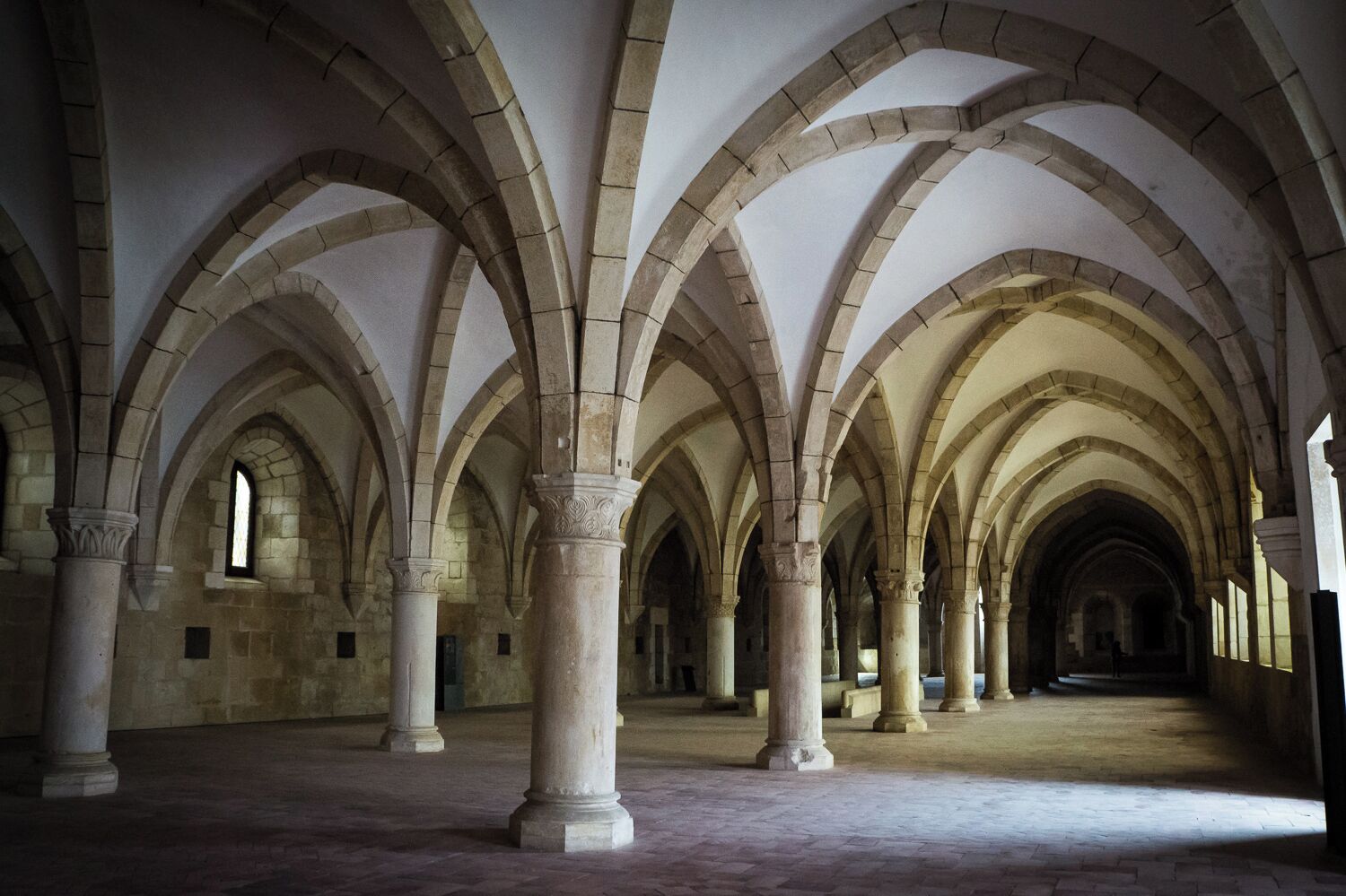 The dormitory is a big Gothic room where the monks slept together: only the abbot was allowed to have his own room.

The Alcobaça Monastery is an impressive Medieval Roman Catholic monastery located in the town of Alcobaça. The church and monastery were one of the first Gothic buildings and one of the most important medieval monasteries in Portugal. Due to its artistic-historical importance and monumental beauty, the Alcobaça Monastery warranted its inscription in the list of UNESCO World Heritage Sites in 1989. http://bit.ly/1U6DEYv