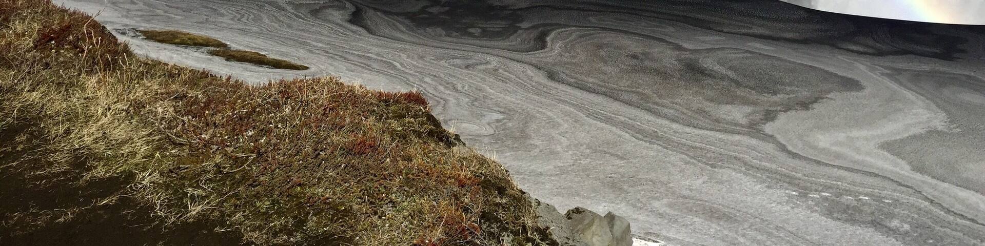 Dettifoss waterfall, one of the most powerful waterfalls in Europe. It was about a half mile walk back to the waterfall and when we were there everything was covered with a pretty thick layer of snow. As we were waking up to the waterfall we saw this complete rainbow stretching across the whole waterfall. A few minutes later, we watched it slowly fade away. Luckily we were able to snap a few pictures before it was gone