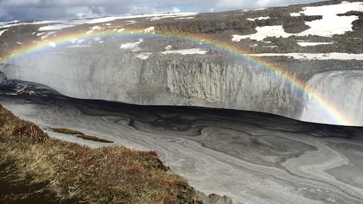 Dettifoss waterfall, one of the most powerful waterfalls in Europe. It was about a half mile walk back to the waterfall and when we were there everything was covered with a pretty thick layer of snow. As we were waking up to the waterfall we saw this complete rainbow stretching across the whole waterfall. A few minutes later, we watched it slowly fade away. Luckily we were able to snap a few pictures before it was gone