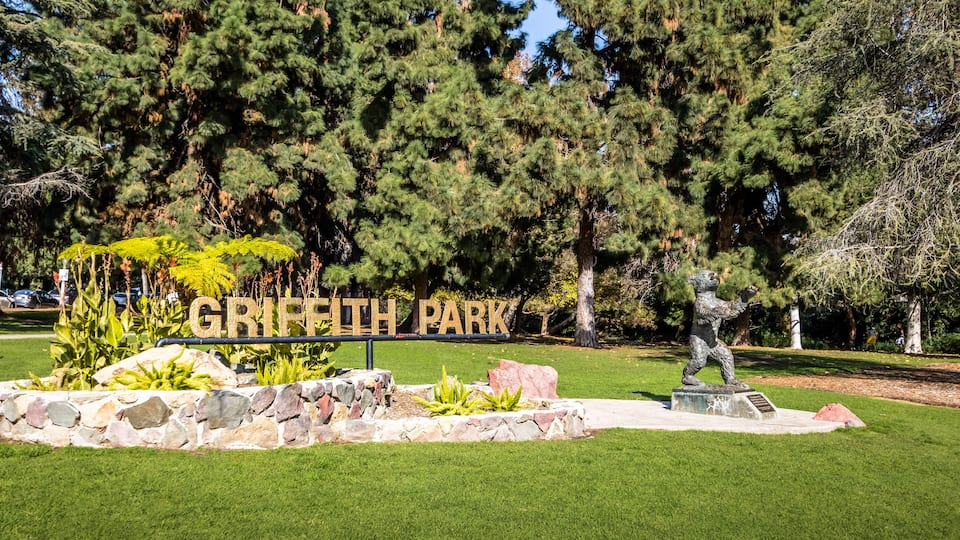 Griffith Park sign and bear statue - Los Angeles, California, USA