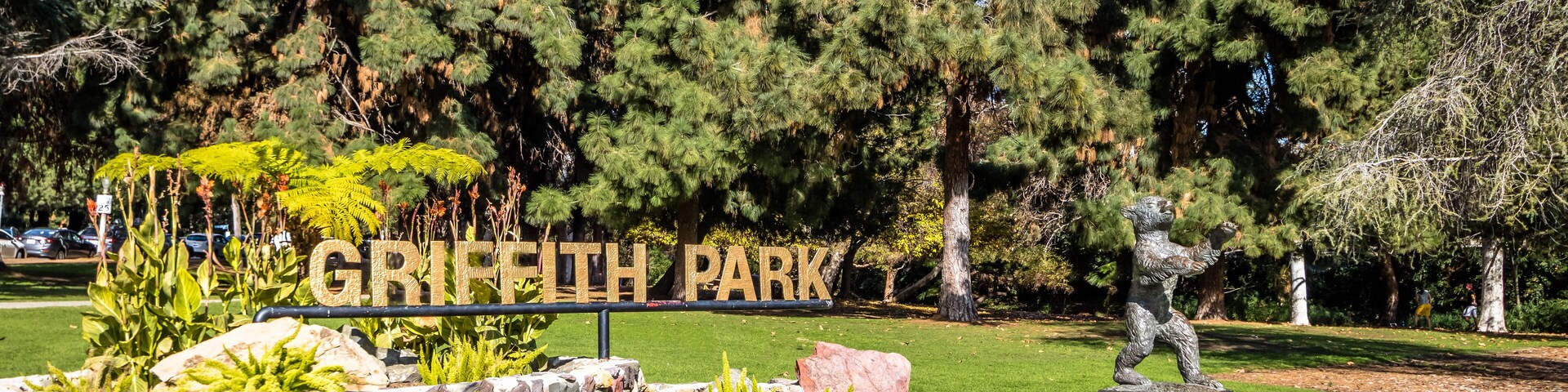 Griffith Park sign and bear statue - Los Angeles, California, USA