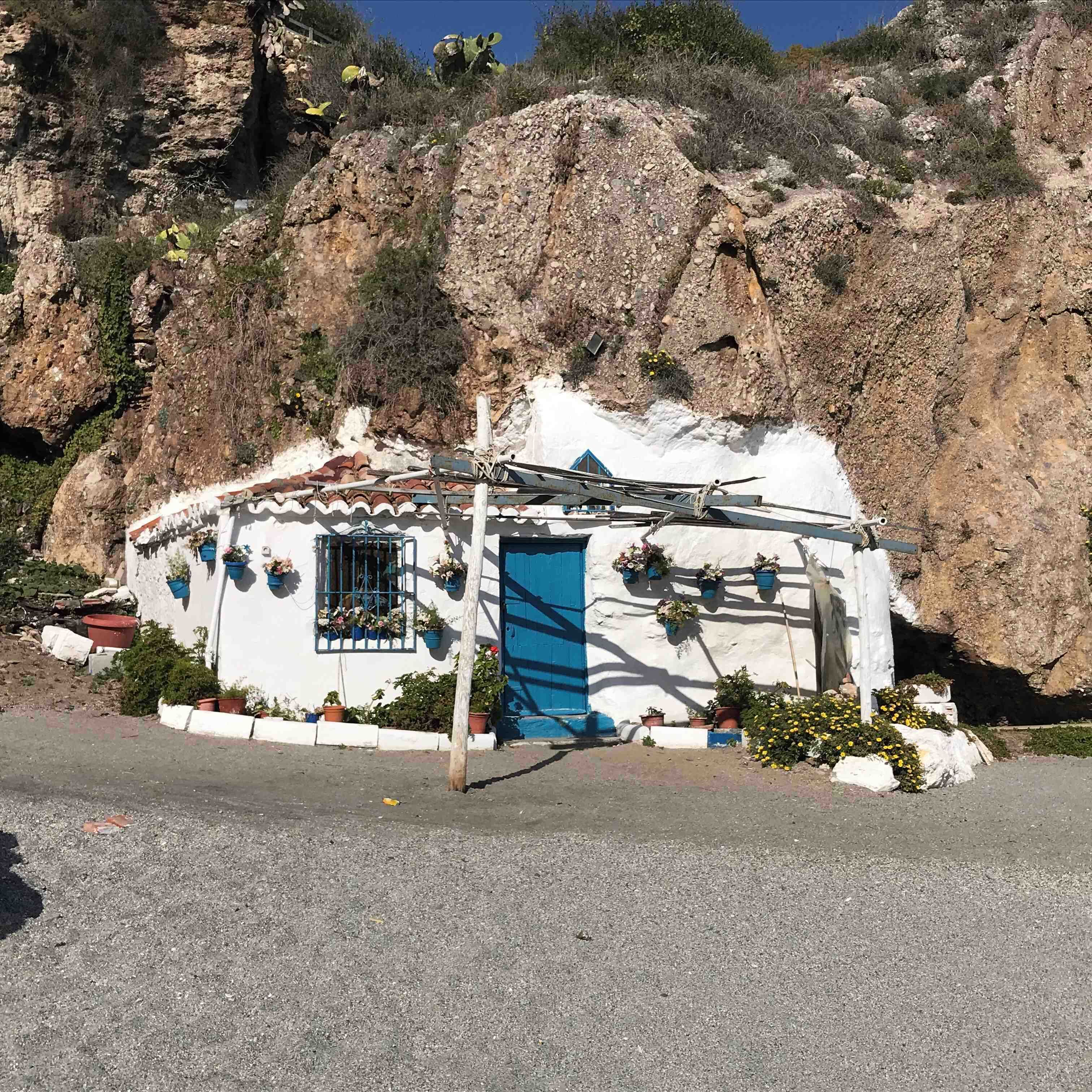 You would have to be brave to live in this little house on the beach in stormy weather!