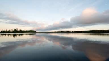 Peaceful warm summer sunrise over Pioneer Lake in Conover, Wisconsin