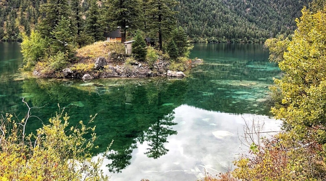 Pavilion Lake in the Marble Canyon Provincial Lake, BC, has a maximum recorded depth of 65m (213’). The beautiful clear blue waters are groundwater fed and have unique and fragile structures on the bottom of the lake. The structures are of various shapes and sizes, some up to 3m high and are estimated to have started forming 11,000 years ago after the glaciers receded from the area. (September 2019)