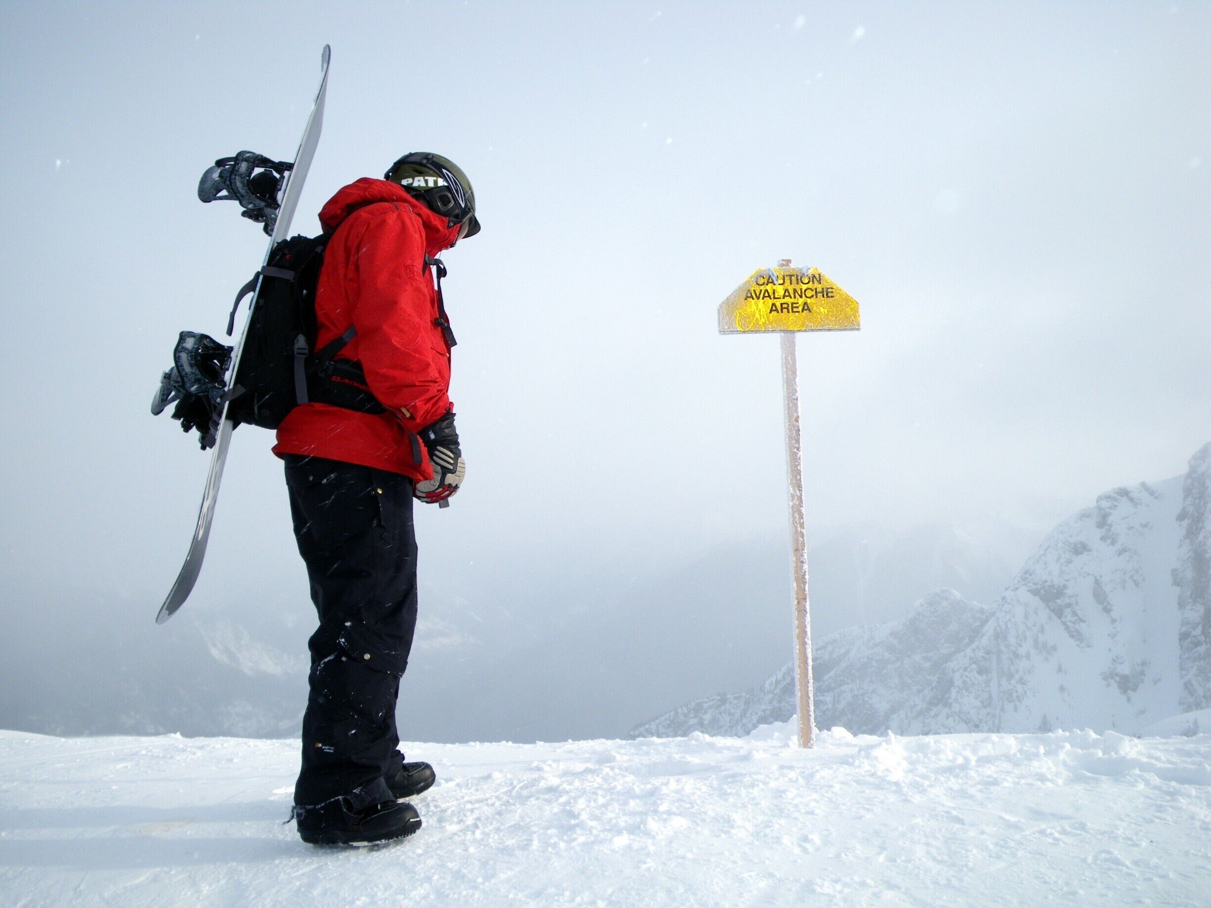 Second thoughts? My boyfriend peering down into North Bowl at the top of Revelstoke Mountain Resort. And yes, we both dropped in to some beautiful, waist deep powder! 