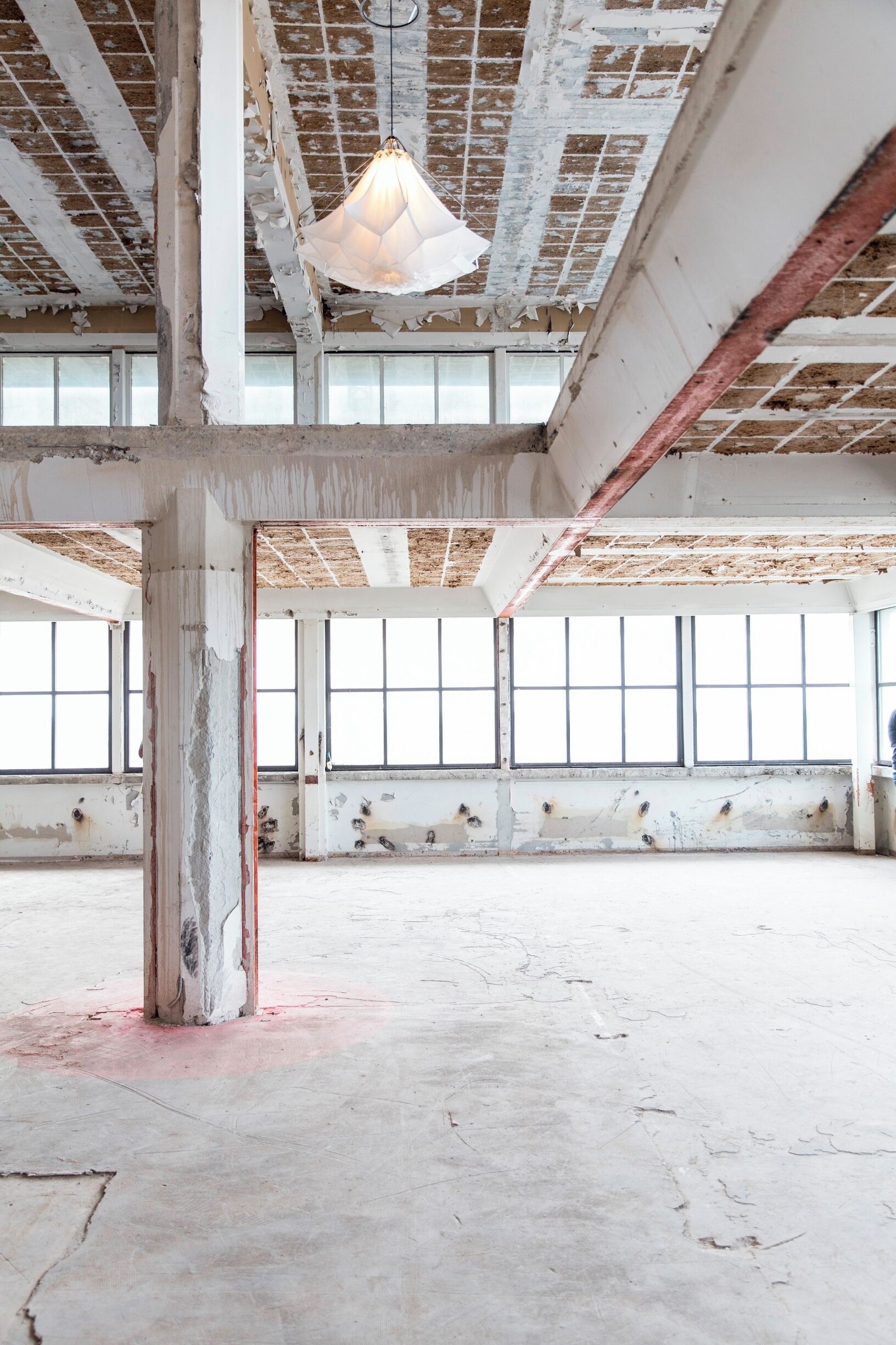 The beautiful Skylight installation by Studio Drift exhibited during the Dutch Design Week on the 10th floor of 'Het Veemgebouw' (the Veembuilding) in Strijp S, Eindhoven. 

Eindhoven, and especially the area Strijp S,  is a great display for how design, technology and history can work together and create a cosy but raw, an exciting but comforting city. 

During the Dutch Design Week it's the worlds center point for design, innovation, art and technology. If you like these things, in combination exploring stunning hidden warehouses, this is a must. It's on every year, at the end of October. 

