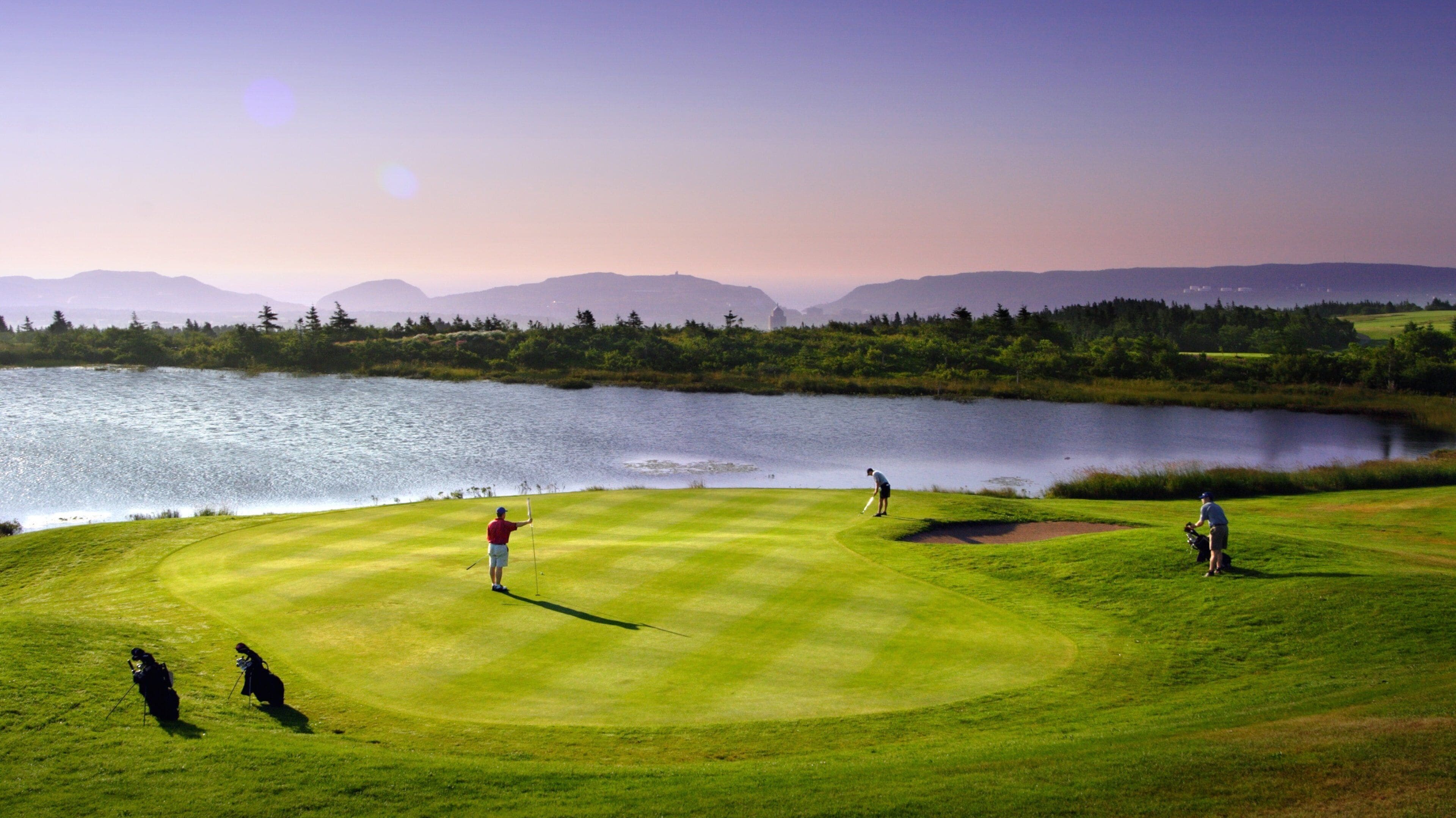 Newfoundland and Labrador showing a sunset, a lake or waterhole and golf