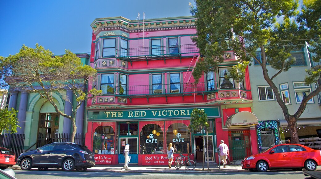 Distrito de Haight-Ashbury mostrando señalización, una casa y estilo de vida de café