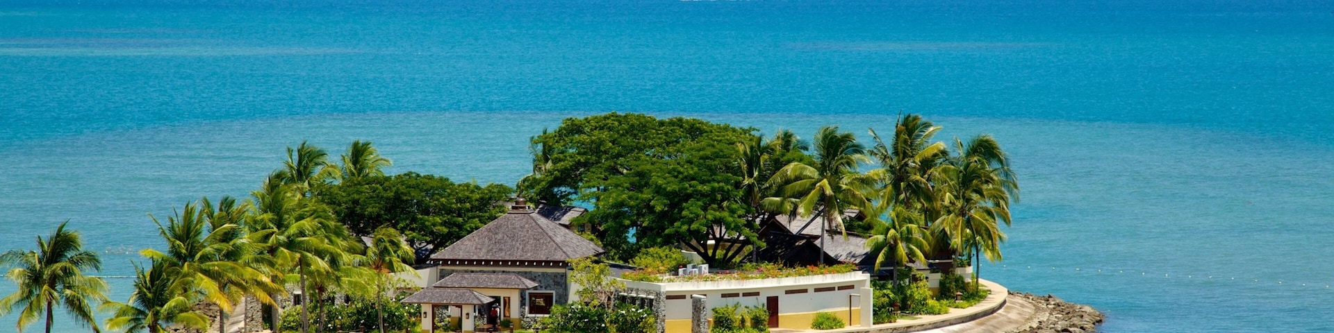 Kota Kinabalu showing a coastal town, tropical scenes and island images