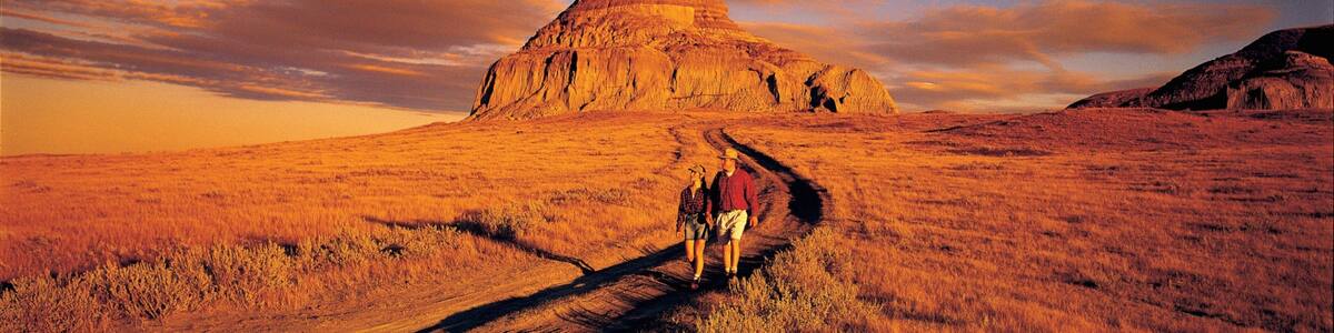 Saskatchewan showing tranquil scenes, a sunset and hiking or walking