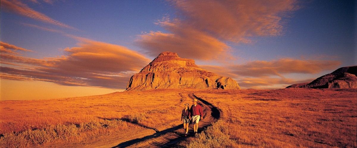 Saskatchewan showing tranquil scenes, a sunset and hiking or walking