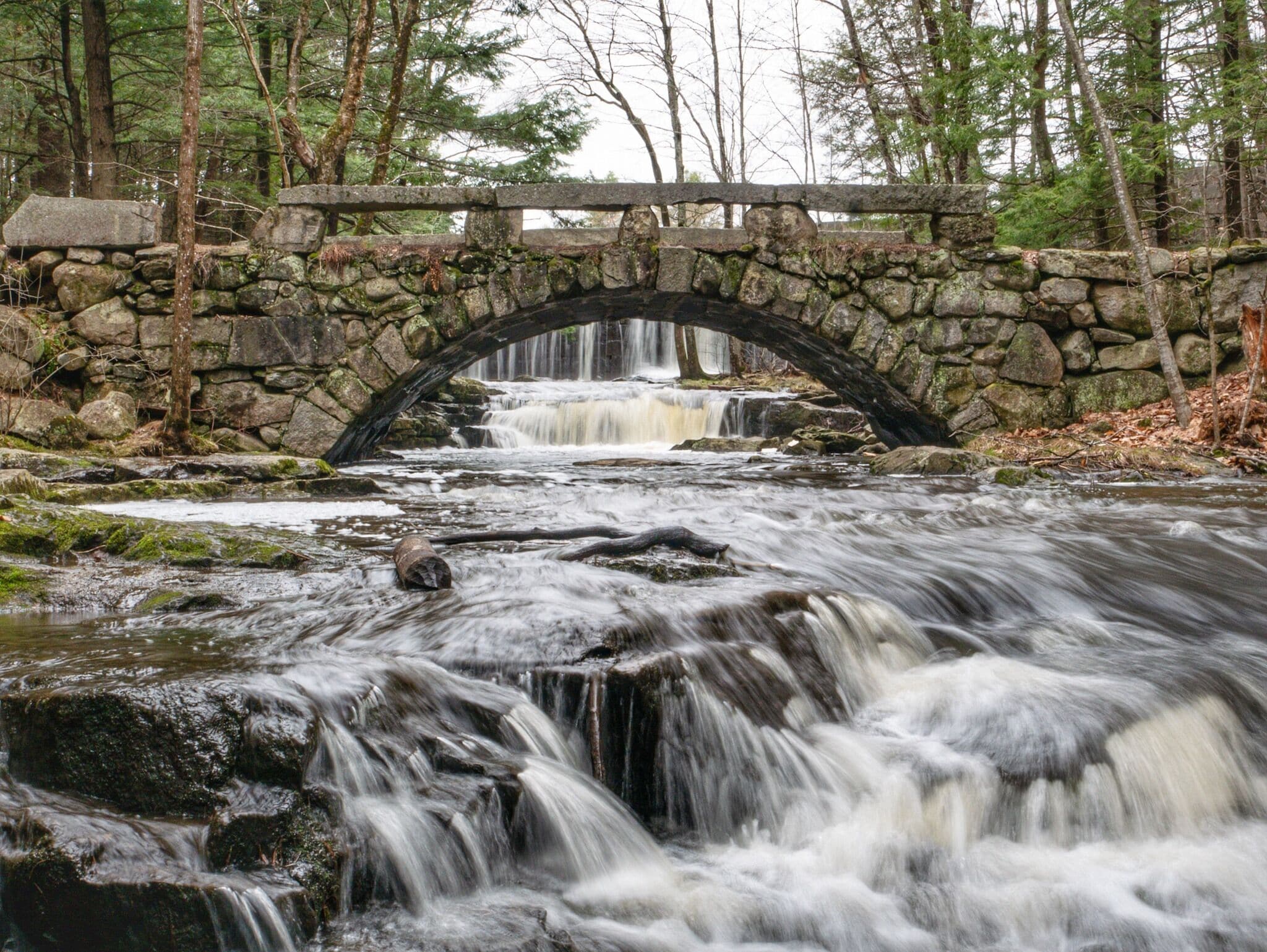 A short walk through the woods brings you to these beautiful waterfalls in Hallowell, outside of Augusta, Maine.  

Read more on my blog: http://www.ericsturgeon.com/blog/vaughan-woods-waterfalls-hallowell/