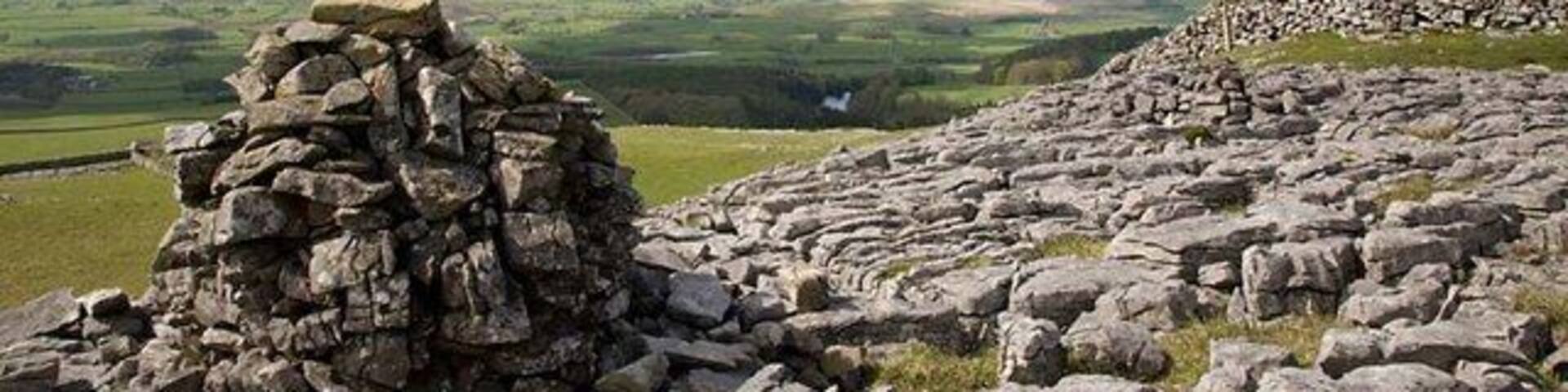 Cairn on Thwaite Scars Looking southwest towards Clapham