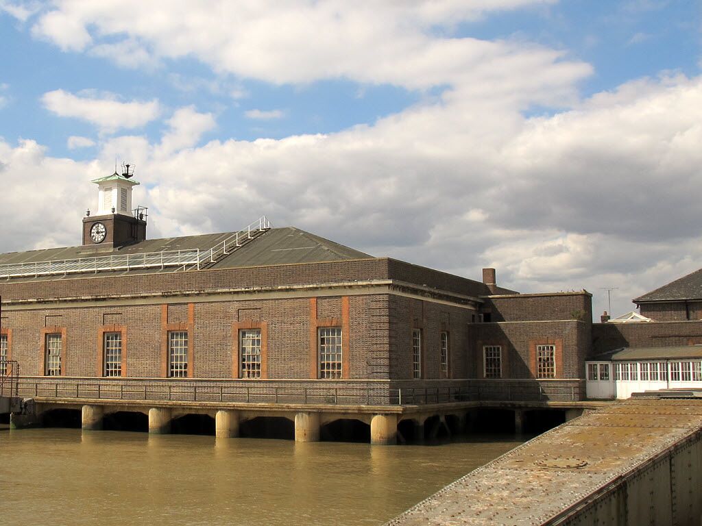 Building at the London International Cruise Terminal. This subsidiary building appears to be built above the water on concrete piles.