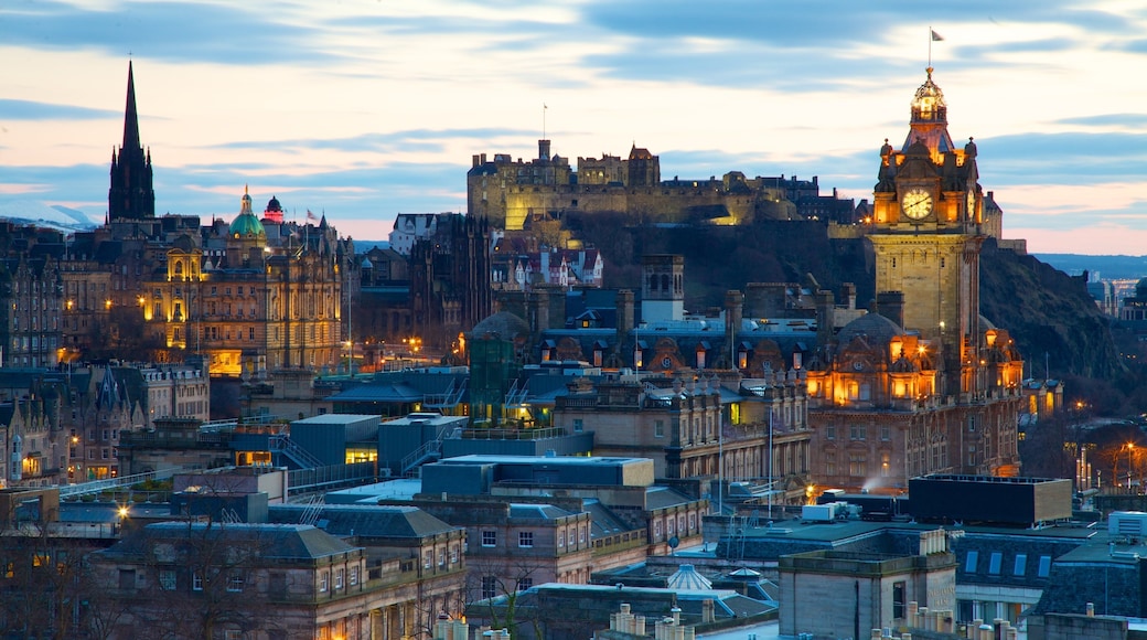 Calton Hill showing a sunset, a city and heritage architecture