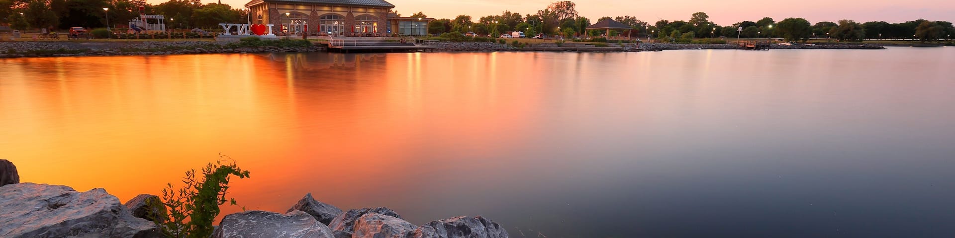 Beautiful sunset of Seneca Lake and Finger Lakes Welcome Center in Finger Lakes region of upstate of New York, Geneva NY USA