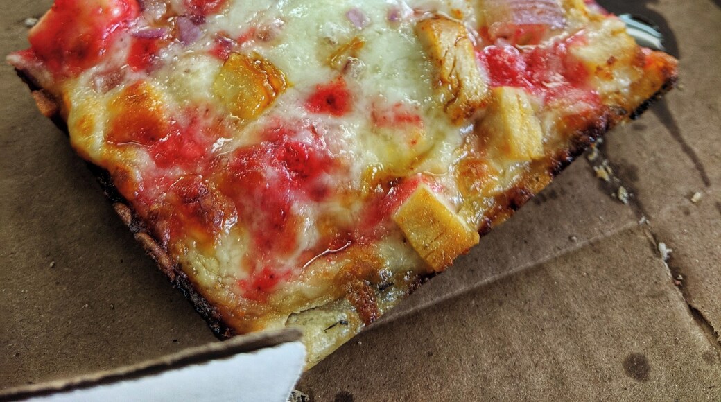 Bangladeshi fusion pizza in the heart of Hamtramck like this tandoori pizza. This city didn't get the motto "The whole world in 2 square miles" for nothing! #pizza #food #amarpizza #hamtramck #detroit #bangladesh #eat #explore #travel #delicious