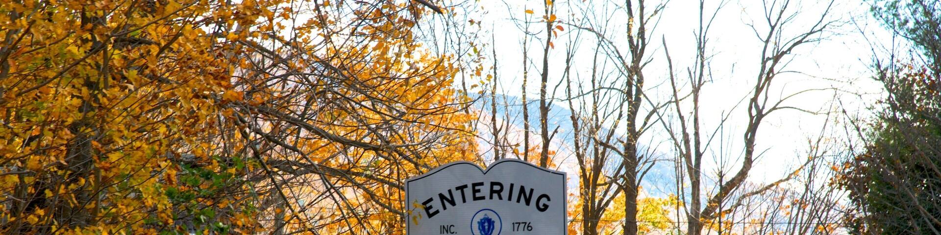 Hancock which includes signage and autumn leaves
